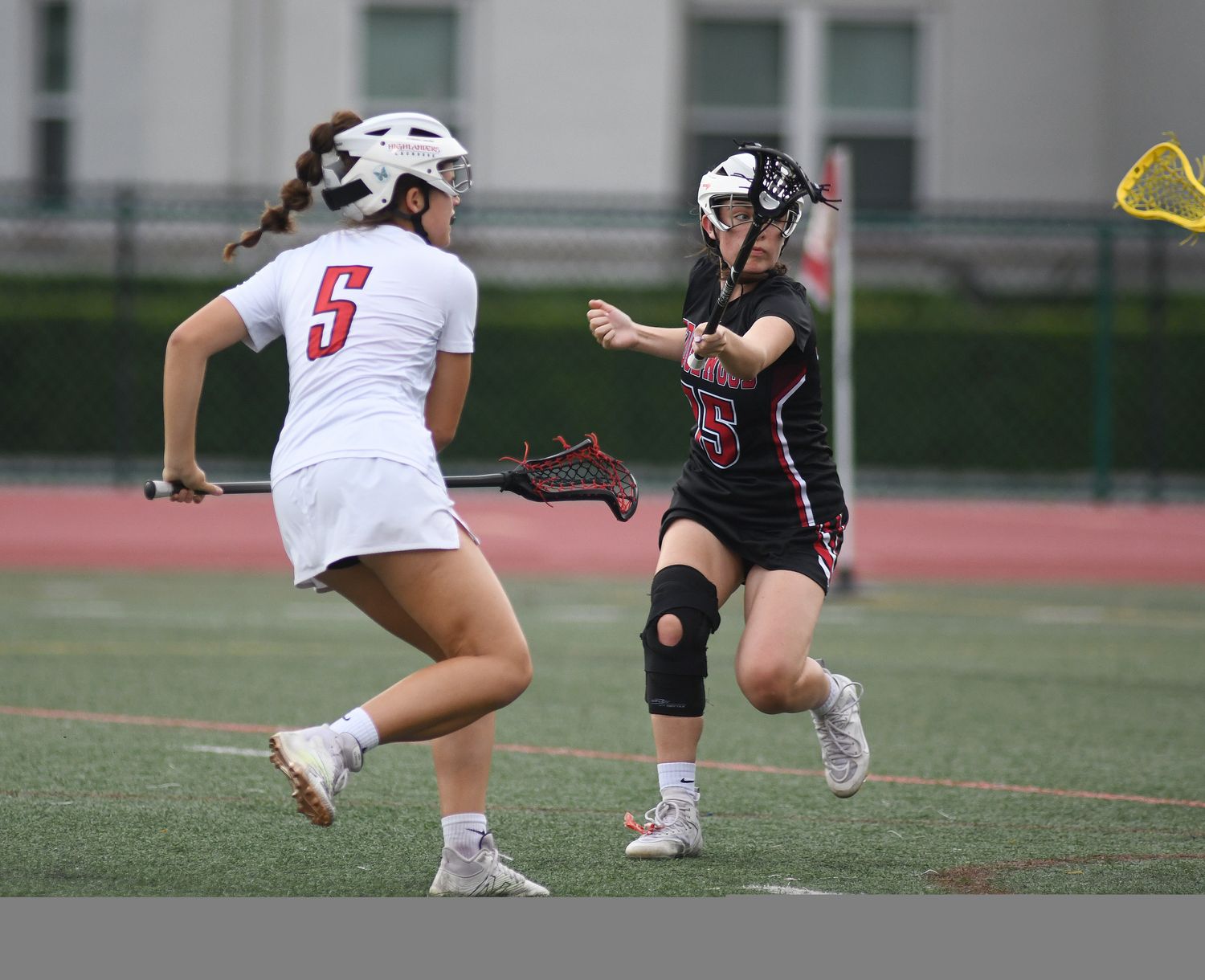 Alexandra Leary, left, scores one of her four goals to guide Lake Highland Prep to an 18-2 victory over Edgewood in the Region 2-1A final.